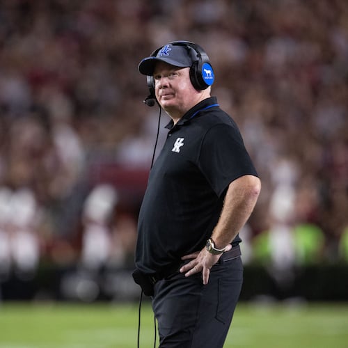 Kentucky coach Mark Stoops — pictured during the Wildcats' 35-13 loss at South Carolina last weekend —  has a tough task Saturday, as Kentucky has lost each of its five trips to Athens by more than 17 points. (Scott Kinser/AP)