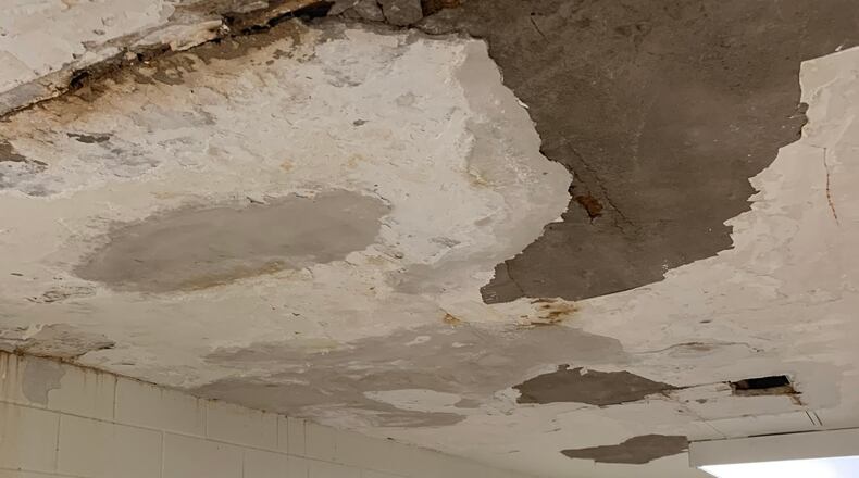 A plaster ceiling at Druid Hills High before it was repaired. After community outcry and state intervention last year over conditions at the school, the DeKalb County School District repaired many of the 96-year-old building's problems. (Courtesy of DeKalb County School District)