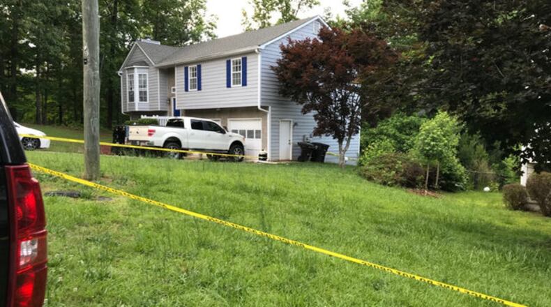 The body was discovered near a home in the Hunters Ridge subdivision Sunday night.