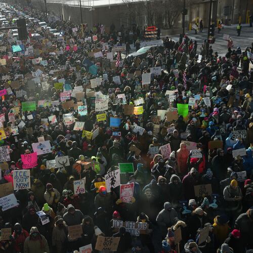 People protest against Federal immigration agents on Friday, Jan. 23, 2026, in Minneapolis. (AP Photo/Angelina Katsanis)