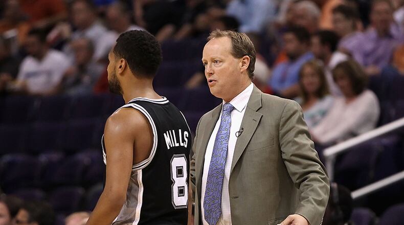 San Antonio assistant coach Mike Budenholzer worked with current Hawks general manager Danny Ferry during his two stints with the Spurs.