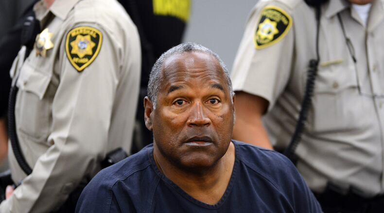 In this May 14, 2013 file photo, O.J. Simpson sits during a break on the second day of an evidentiary hearing in Clark County District Court in Las Vegas.