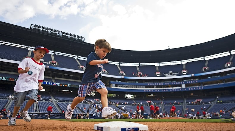 On Sundays after games at Turner Field, kids can run the bases out on the real field, a prized experience for many families. Let them go at it this year, ‘cause it’s their last chance at Turner. CONTRIBUTED BY ATLANTA BRAVES