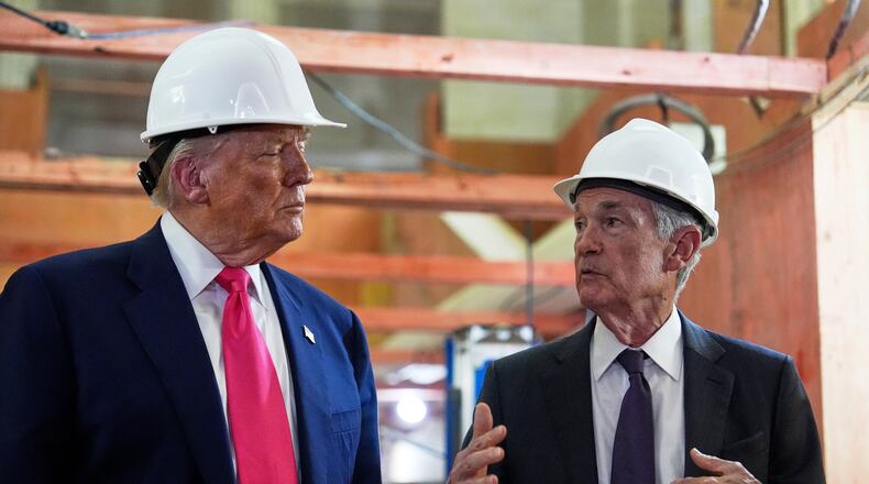FILE - President Donald Trump listens to Federal Reserve Chairman Jerome Powell speak during a visit to the Federal Reserve, July 24, 2025, in Washington. (AP Photo/Julia Demaree Nikhinson, File)