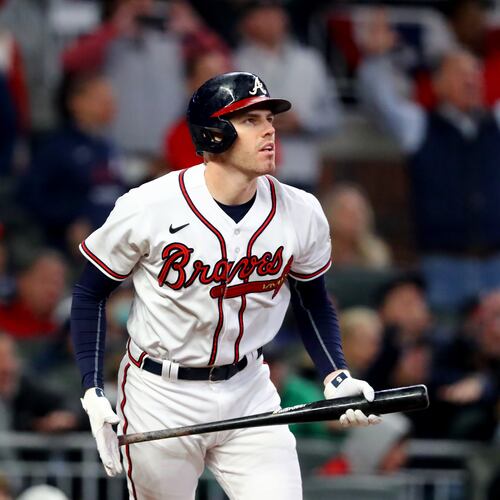 First baseman Freddie Freeman, pictured during the 2021 World Series with the Braves, has over 2,500 hits and is approaching 400 home runs in his career. The looming debate is whether he would represent the Braves or Dodgers – or neither – on a Hall of Fame plaque. (Curtis Compton/AJC)