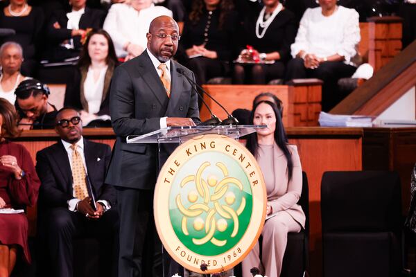 U.S. Sen. Raphael Warnock, D-Ga., spoke about Martin Luther King Jr. at a gathering in Atlanta on Monday. (Abbey Cutrer/AJC)