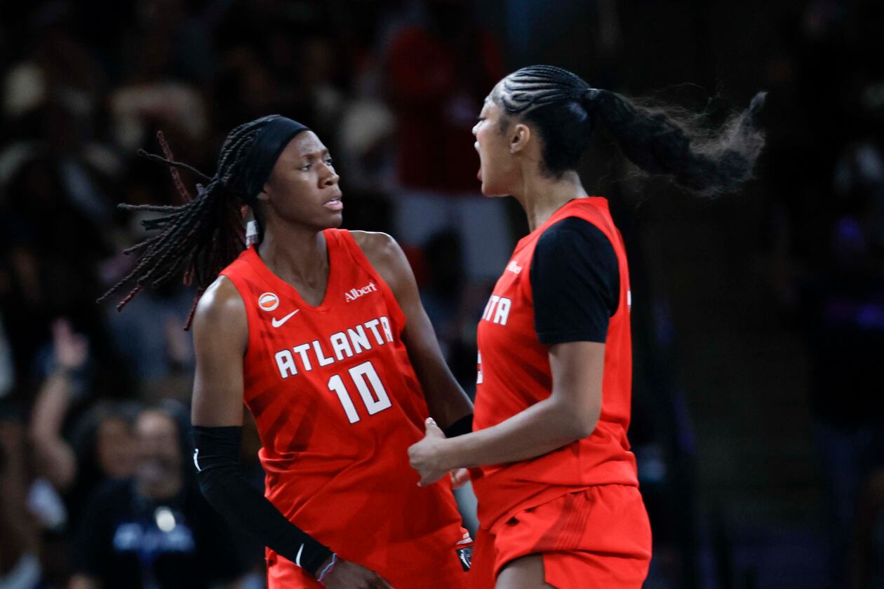 Atlanta Dream forward Angel Reese (5) celebrates with teammate Atlanta Dream guard Rhyne Howard (10) after Howard scores a three-pointer in the second half of a WNBA game against the Minnesota Lynx at Gateway Center Arena on Sunday, August 30, 2026, in Atlanta. (Miguel Martinez/ AJC)