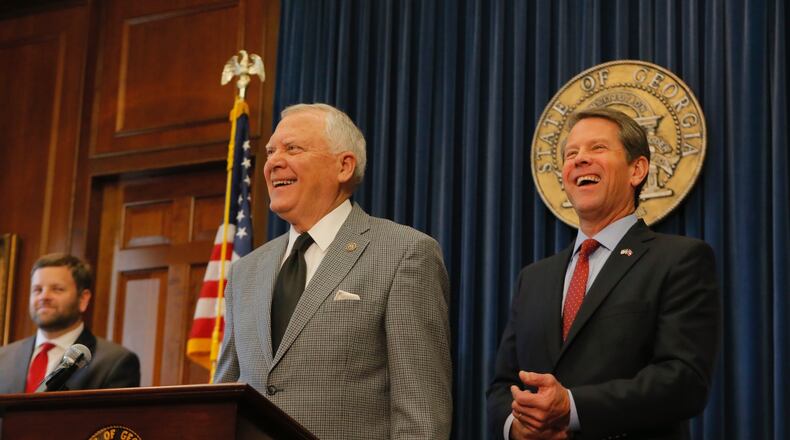 Then-Gov. Nathan Deal and Brian Kemp, then secretary of state, at a news conference on Nov. 8, 2018. Kemp, now governor, is running for reelection against Democrat Stacey Abrams. (Bob Andres/AJC)