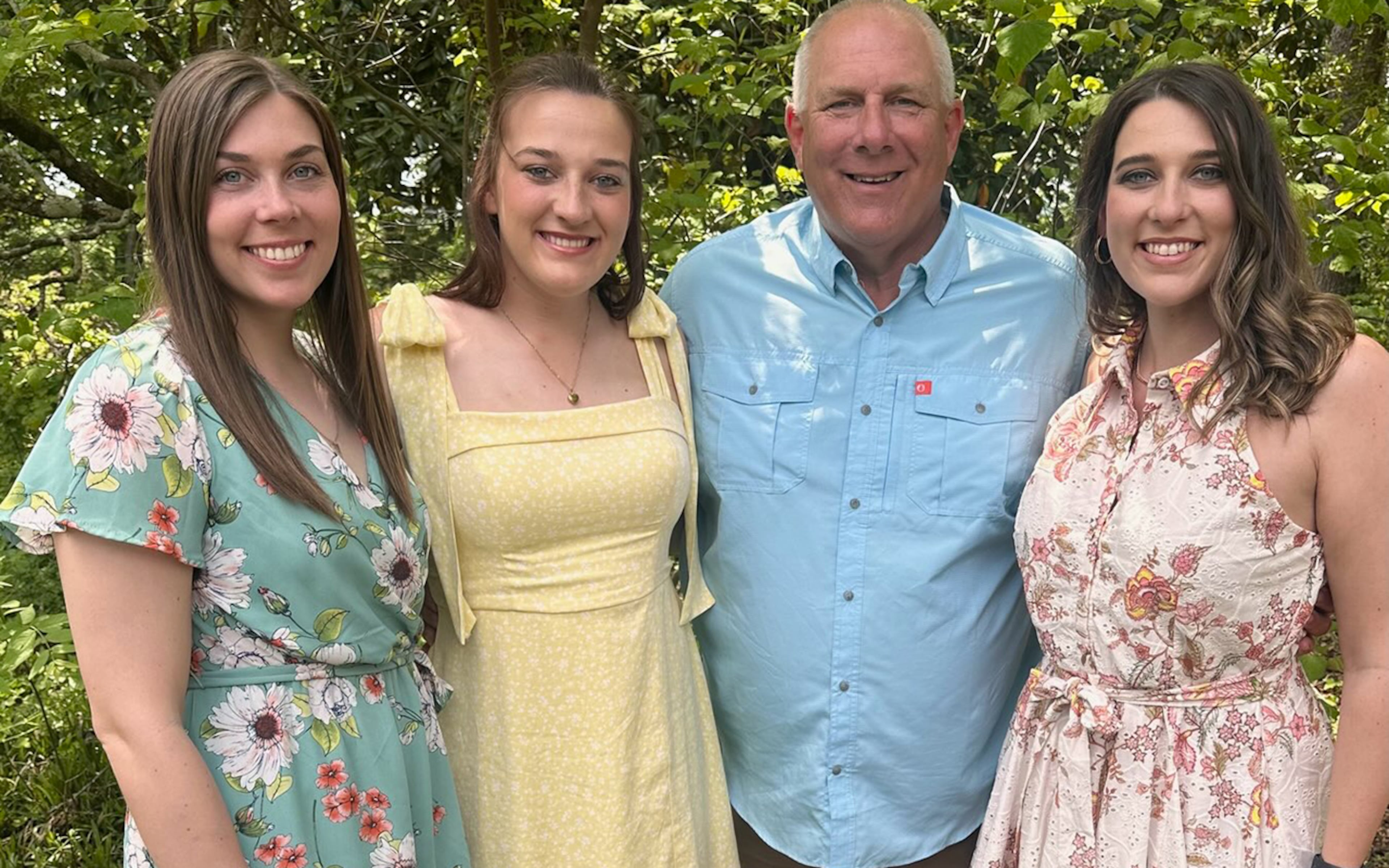 Gordon Lee multisport coach Kevin McElhaney and his daughters (from left) Katherine Grace, Charlsie and Tori won a total of six GHSA state titles together. Katherine Grace won three in softball and Tori separately won two with their father as assistant coach, while Charlsie's golf team won a state title in May with her father as head coach. (Courtesy of the McElhaney family)