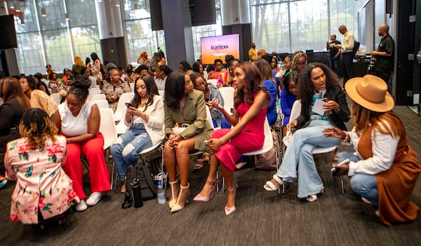 Attendees network during a break at the Fearless Moguls Summit held at The Gathering Spot ATL on Fri., Aug. 30, 2024, for women of color entrepreneurs. (Jenni Girtman for The Atlanta Journal-Constitution)