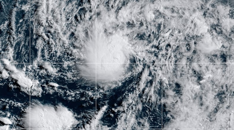 This satellite image provided by CIRA/NOAA, shows Tropical Storm Amanda forming in the Pacific Ocean, on Wednesday, June 3, 2026. (CIRA/NOAA via AP)