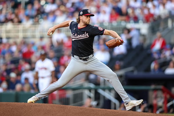 Washington Nationals pitcher Jake Irvin delivers in the first inning of a baseball game against the Atlanta Braves, Monday, May 12, 2025, in Atlanta. (AP Photo/Colin Hubbard)