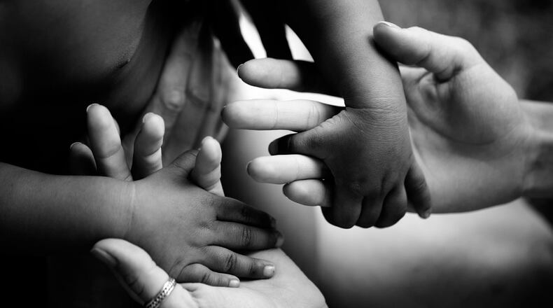 A Georgia family adopted a 10-year-old girl, and her little brother and little sister, after the three spent more than 1,100 days in the foster system.