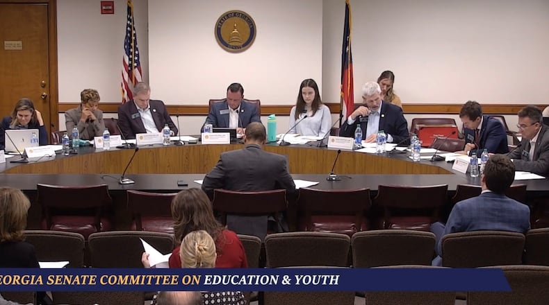 Democratic state Rep. Omari Crawford sits in class at the Senate Education and Youth Committee getting schooled in how bills are torn up and put back together.
