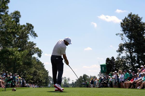 Scottie Scheffler hits his tee shot on the ninth hole during the first round at the Masters golf tournament, Thursday, April 10, 2025, in Augusta, Ga. (AP Photo/Ashley Landis)
