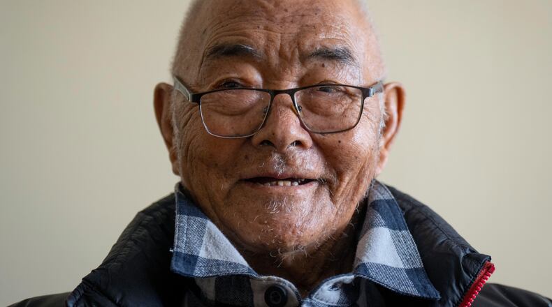 FILE - Kanchha Sherpa, 91, who was among the 35 members in the team that put New Zealander Edmund Hillary and his Sherpa guide Tenzing Norgay atop the 8,849-meter (29,032-foot) peak on May 29, 1953, speaks during an interview with The Associated press in Kathmandu, Nepal, March 2, 2024. (AP Photo/Niranjan Shrestha, File)