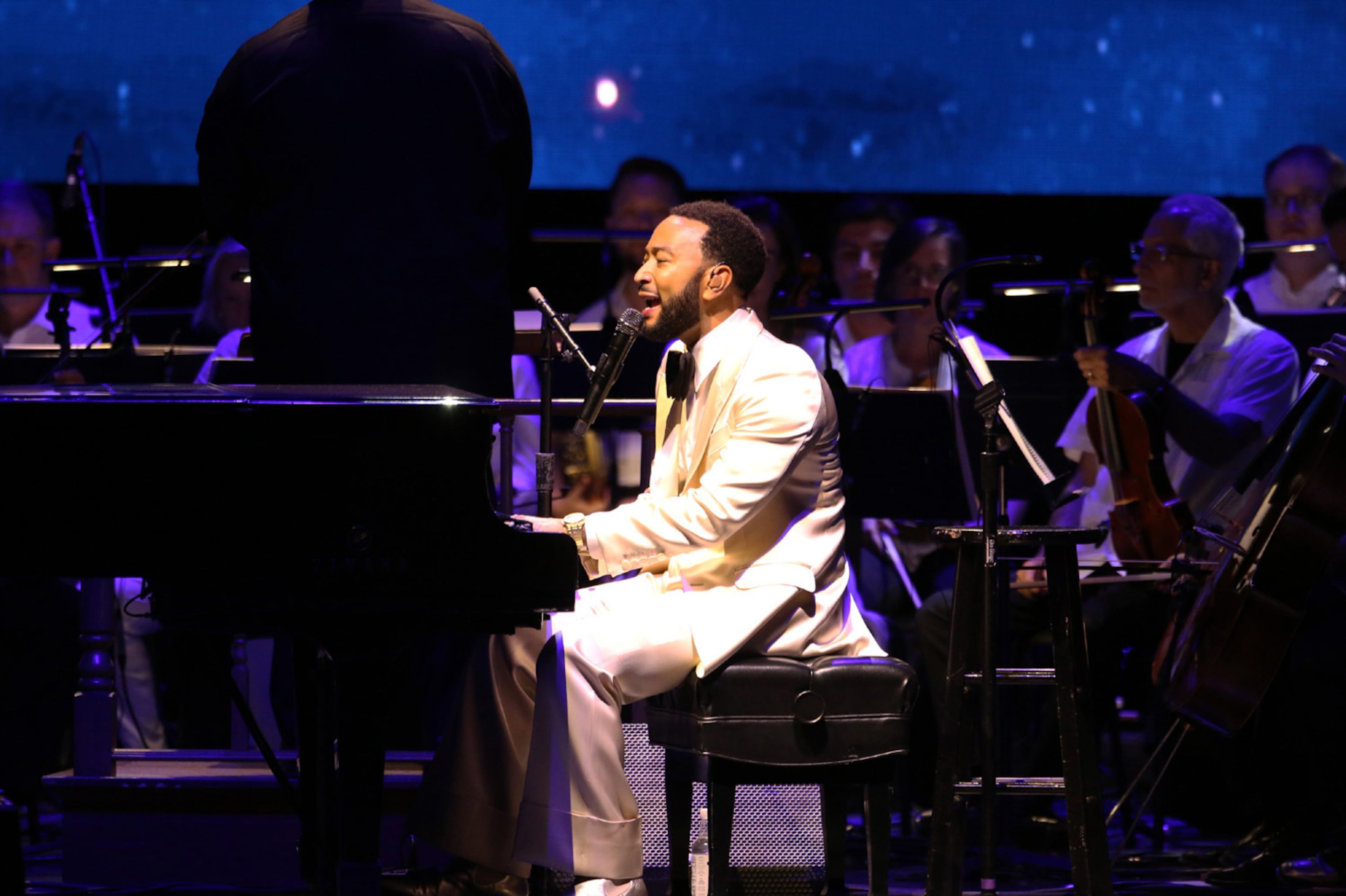 John Legend and the Atlanta Symphony Orchestra entertained a large Ameris Bank Amphitheatre crowd on Sept. 9, 2024, in Alpharetta. Legend will perform in Atlanta again this Sept. 20 during the High Museum of Art's Driskell Prize Gala. (Robb Cohen for The Atlanta Journal-Constitution)