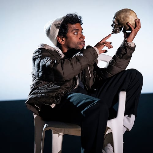 This image released by Polk & Co. shows Hiran Abeysekera in the role of Hamlet at the National Theatre in London on Sept. 25, 2025. (Sam Taylor/Polk & Co. via AP)