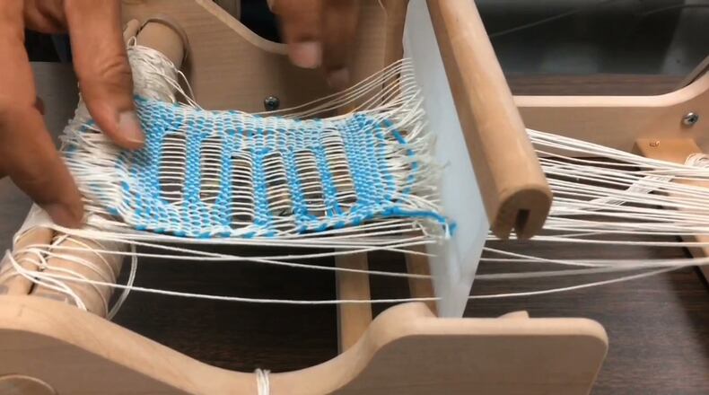 UCF professor Jayan Thomas has been researching technology that could lead to clothing that will capture and generate solar power. (UCF/TNS)