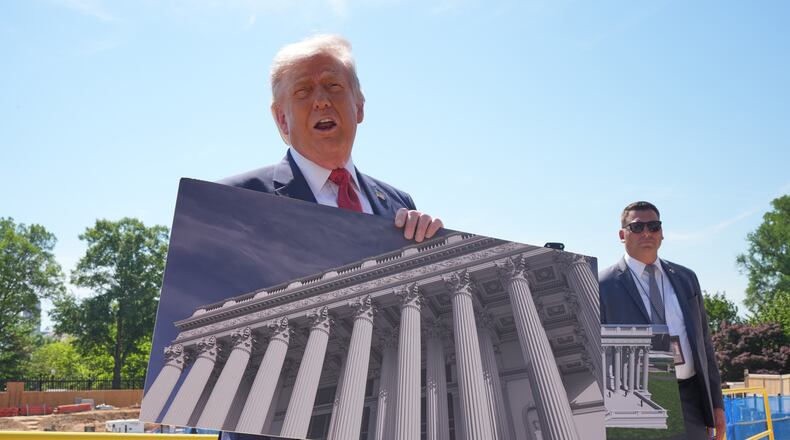 President Donald Trump tours Ballroom construction around the outside the White House, Tuesday, May 19, 2026, in Washington. (AP Photo/Jacquelyn Martin)
