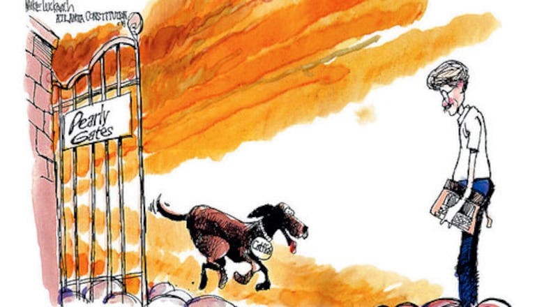 This cartoon by AJC's Mike Luckovich shows Lewis Grizzard being greeted by his dog, Catfish, at the entrance to heaven.
