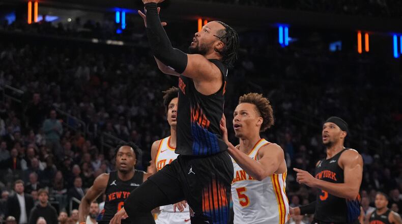 New York Knicks' Jalen Brunson drives past Atlanta Hawks' Dyson Daniels (5) during the first half in Game 5 of a first-round NBA playoffs basketball series, Tuesday, April 28, 2026, in New York. (AP Photo/Frank Franklin II)