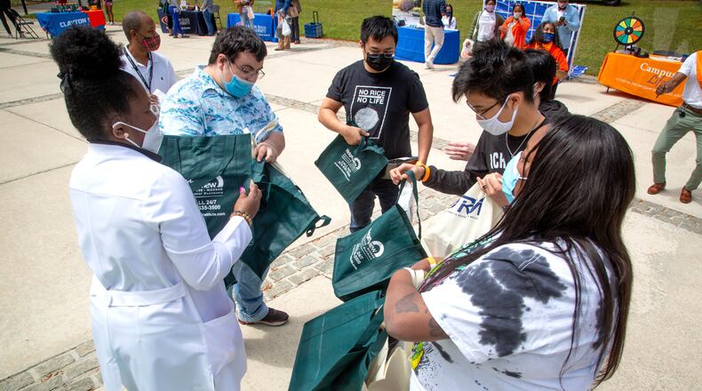 Clayton State University assistant nursing professor Tamara Thompson-Jackson talks with students about mental health issues during a  campus health fair Friday, April 16, 2021.  STEVE SCHAEFER FOR THE ATLANTA JOURNAL-CONSTITUTION