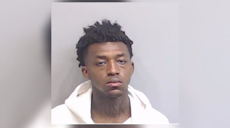 J'Saan Carlos Strover was able to push past sheriff's deputies when they removed his leg shackles to take a staircase, authorities said.