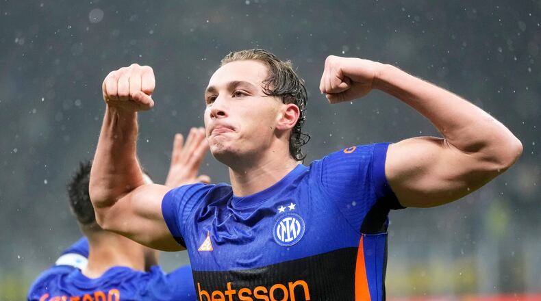 Inter Milan's Francesco Pio Esposito celebrates after scoring his side's third goal during a Serie A soccer match between Inter Milan and Pisa, in Milan, Italy, Friday, Jan. 23, 2026. (AP Photo/Luca Bruno)