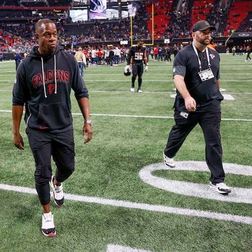 Atlanta Falcons head coach Raheem Morris leaves the field after the game, following the Seattle Seahawks’ 37-9 win at Mercedes-Benz Stadium in Atlanta on Sunday, Dec. 7, 2025. (Miguel Martinez/ AJC)