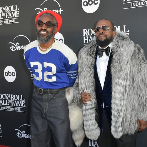 Andre 3000, left and Big Boi, of Outkast arrive at the 2025 Rock and Roll Hall of Fame Induction Ceremony on Saturday, Nov. 8, 2025, at L.A. Live in Los Angeles. (Photo by Richard Shotwell/Invision/AP)