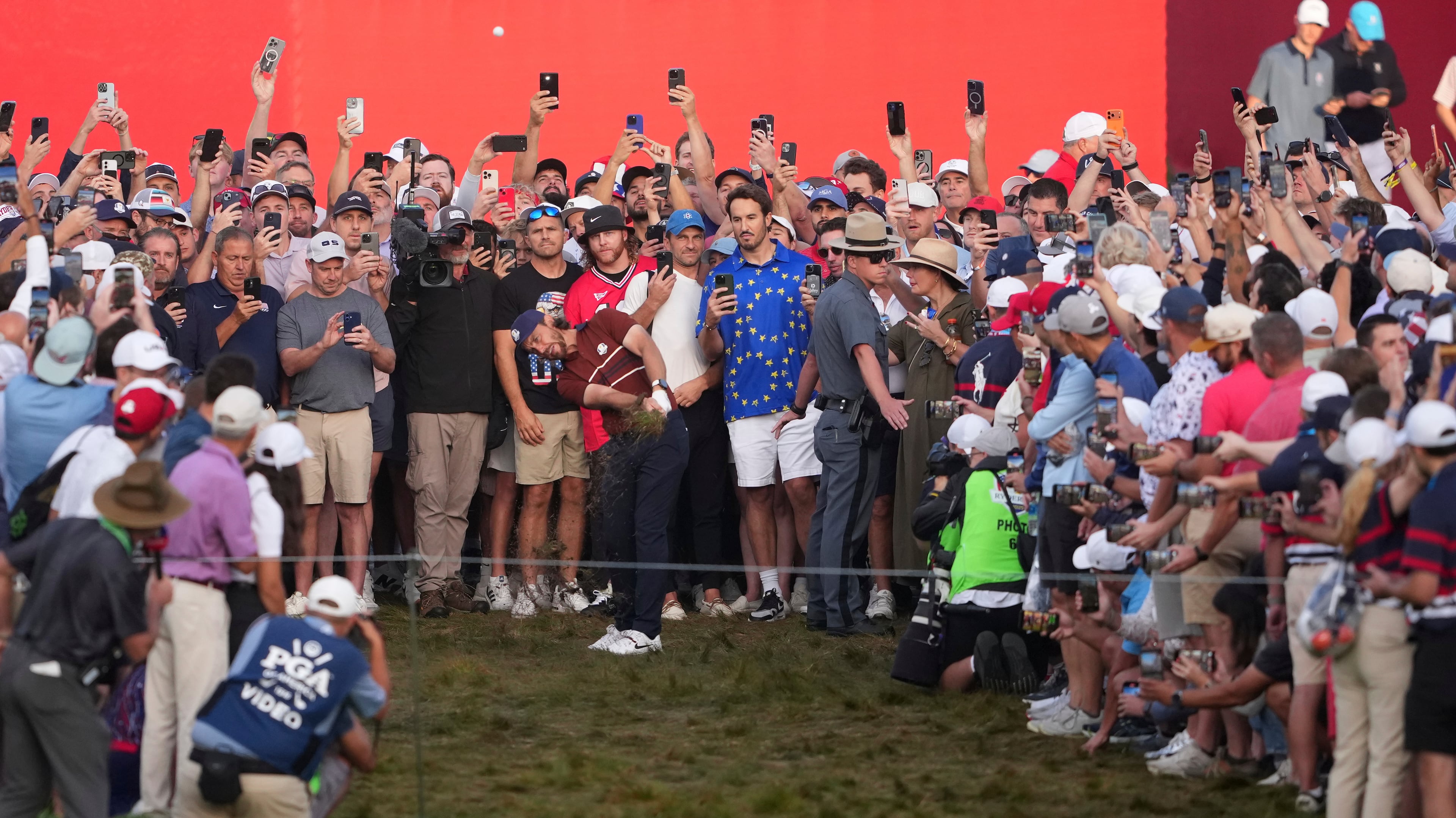 Europe's Tommy Fleetwood hits from the rough on the first hole at Bethpage Black golf course during the Ryder Cup golf tournament, Saturday, Sept. 27, 2025, in Farmingdale, N.Y. (AP Photo/Lindsey Wasson)