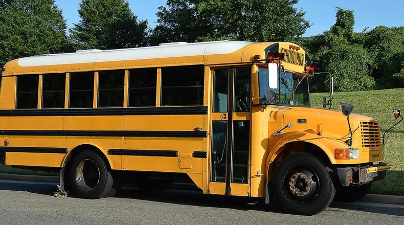 A boy attempting to board a school bus in Tennessee was hit by a car traveling in the opposite direction Tuesday morning.