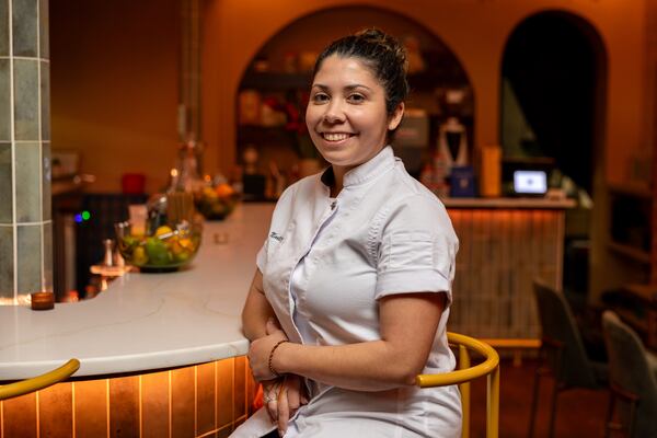 Pastry chef and co-owner Claudia Martinez poses at Bar Ana in Atlanta on Thursday, December 4, 2025. (Arvin Temkar / AJC)