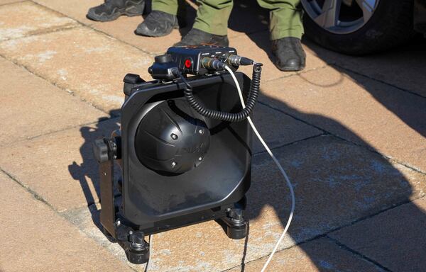 In this photo provided by the Serbian Interior Ministry, Serbian Gendarmerie officers show the U.S.-made Long Range Acoustic Device (LRAD) – which is illegal in Serbia and many other countries, in Belgrade, Serbia, Wednesday, March 19, 2025. (Serbian Ministry of Interior via AP)