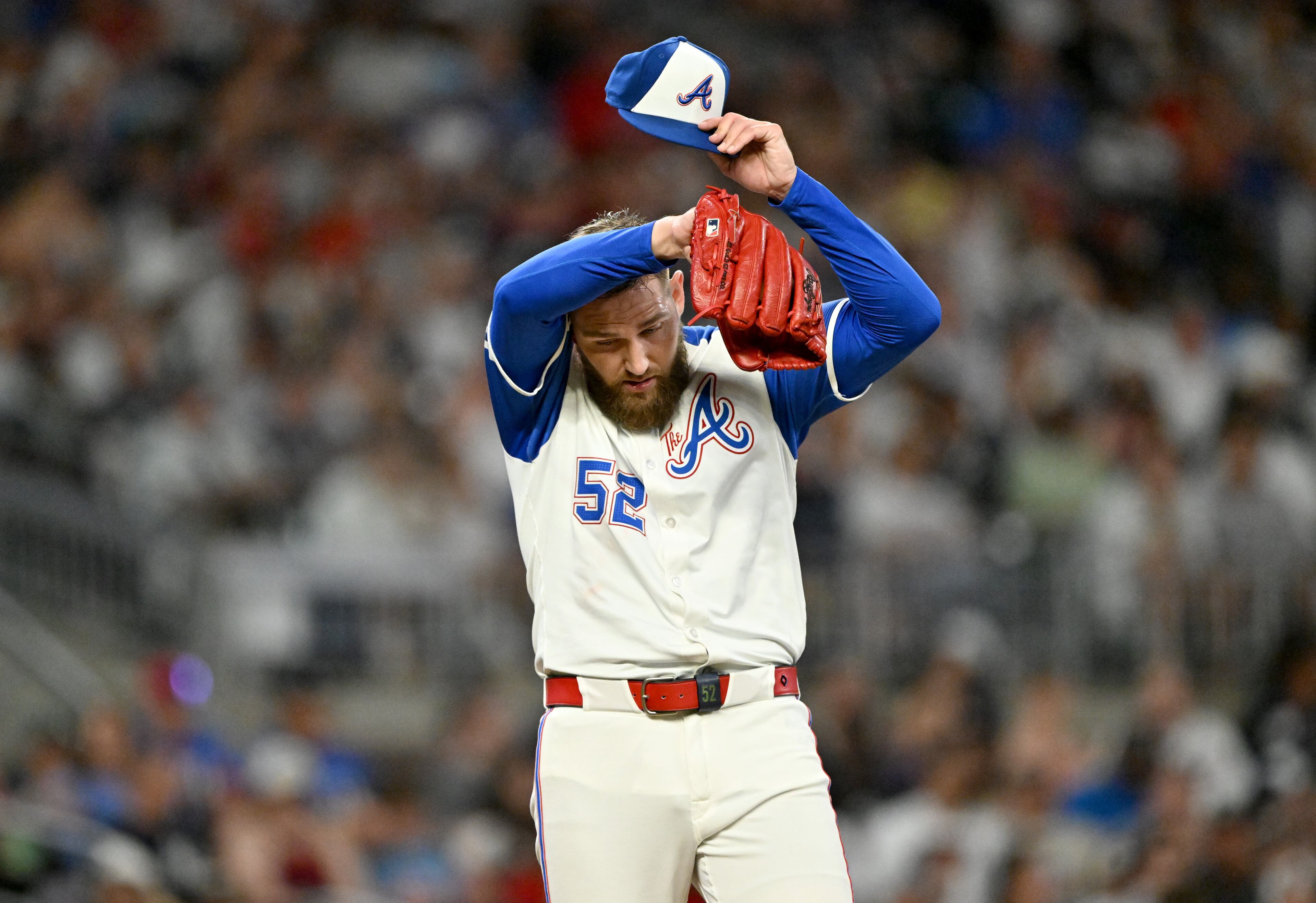 Atlanta Braves pitcher Dylan Lee (52) reacts during the eighth inning of a baseball game at Truist Park, Saturday, July 19, 2025, in Atlanta. New York Yankees won 12-9 over Atlanta Braves. (Hyosub Shin / AJC)