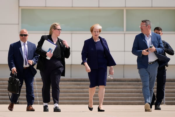 New York State Department of Labor commissioner Roberta Reardon, center, walks out of federal court after the sentencing of former U.S. Rep. George Santos, Friday, April 25, 2025, in Central Islip, N.Y. (AP Photo/Julia Demaree Nikhinson)