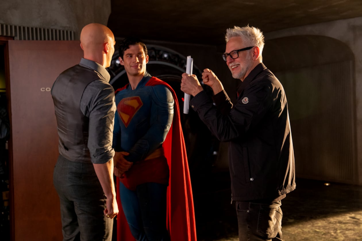 DC Studios co-CEO and director James Gunn (right) works with actors David Corenswet (center) and Nicholas Hoult on the set of "Superman," which generated $616 million in worldwide box office gross this summer. (Courtesy of Warner Brothers)