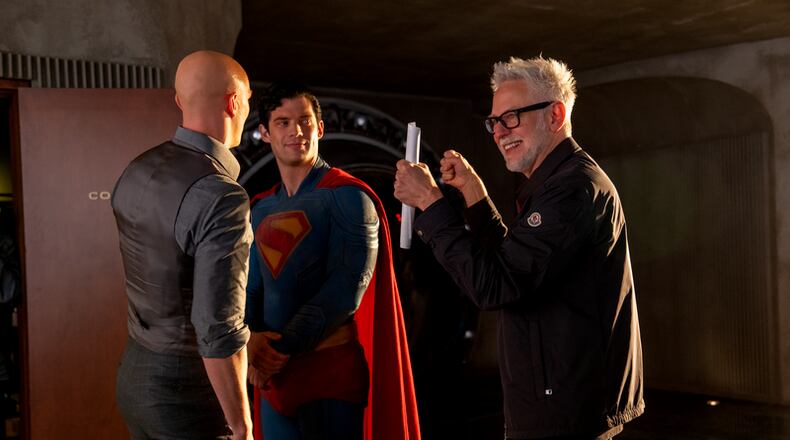 DC Studios co-CEO and director James Gunn (right) works with actors David Corenswet (center) and Nicholas Hoult on the set of "Superman," which generated $616 million in worldwide box office gross this summer. (Courtesy of Warner Brothers)