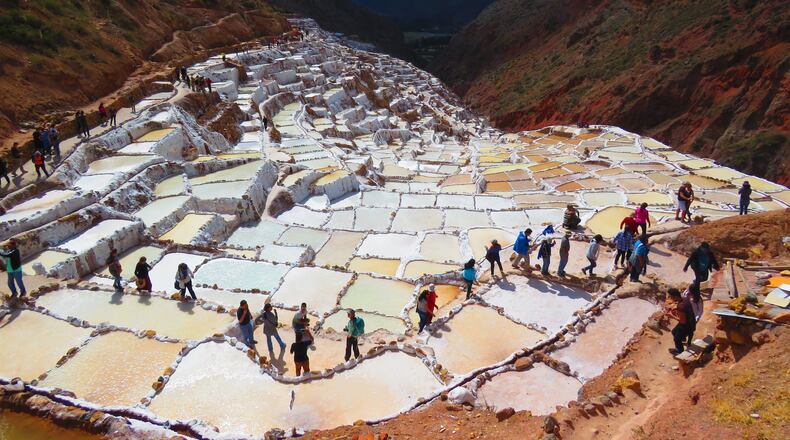 The Salt Pans in Maras, Peru, include more than 3,000 terraced pools fed by an underground spring where salt is harvested using pre-Incan methods. (Courtesy of Museum of Design Atlanta)