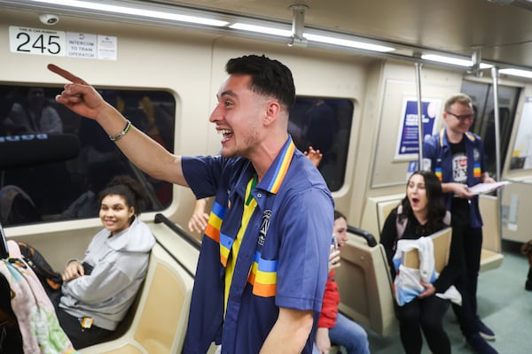 Barbosa raps against competitors on the train during his attempt to set a Guinness World Record for the fastest time visiting every single MARTA station on Thursday, Jan. 8, 2026. (Abbey Cutrer/AJC)