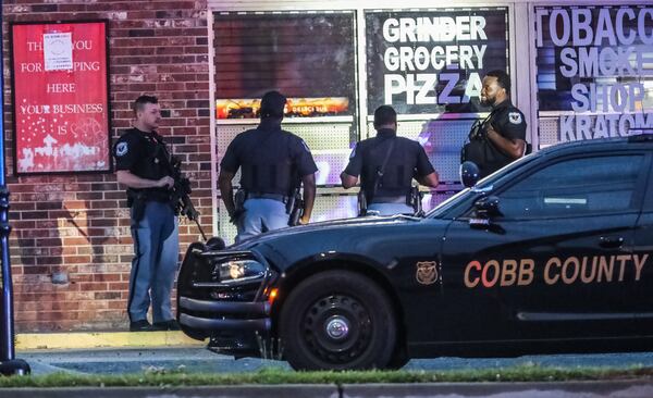 Cobb County police responded to an alarm call at a shopping center Tuesday morning.