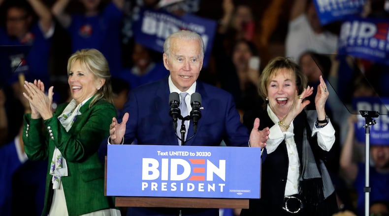 Democratic presidential candidate former Vice President Joe Biden speaks at a primary election night campaign rally Tuesday, March 3, 2020, in Los Angeles with his wife Jill Biden, left, and his sister Valerie. (AP Photo/Chris Carlson)