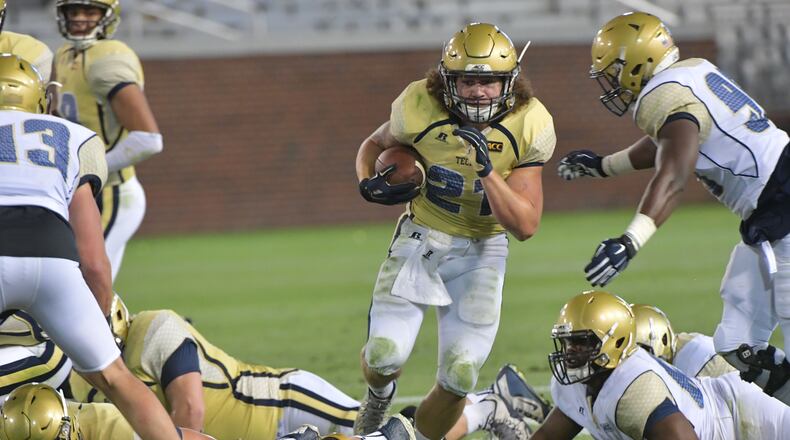 April 21, 2017 Atlanta - Georgia Tech Gold Team running back Quaide Weimerskirch (21) runs with the ball during 2017 Georgia Tech Football Spring Game at Bobby Dodd Stadium on Friday, April 21, 2017. HYOSUB SHIN / HSHIN@AJC.COM
