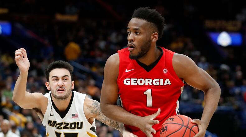 Georgia's Yante Maten (1) heads to the basket past Missouri's Jordan Geist (15) during the second half in an NCAA college basketball game at the Southeastern Conference tournament Thursday, March 8, 2018, in St. Louis. Georgia won 62-60. (AP Photo/Jeff Roberson)
