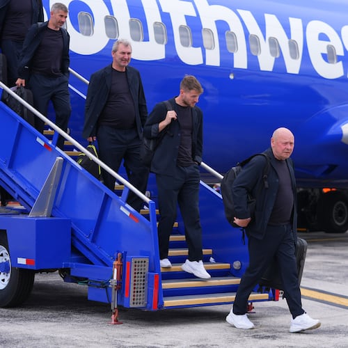 Czechia men's national soccer team head coach Miroslav Koubek, right, arrives with his team at Dallas Love Field Airport, Friday, June 5, 2026, in Dallas, ahead of the World Cup soccer tournament. (AP Photo/Julio Cortez)