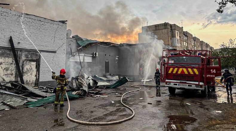 In this photo provided by the Ukrainian Emergency Service, firefighters put out the fire at a prayer house of a local Protestant community of Evangelical Christian Baptists following Russian air attack in Balakliia, Kharkiv region, Ukraine, Saturday, May 23, 2026. (Ukrainian Emergency Service via AP)