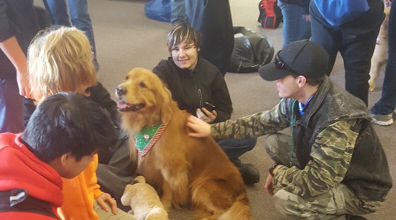A little puppy love gave students at South Cobb High a break from test stress at the end of the December term. Contributed.