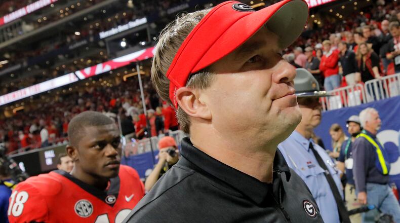 Georgia coach Kirby Smart walks off the field after the Bulldogs lost to Aabama 35-28 in the SEC championship.