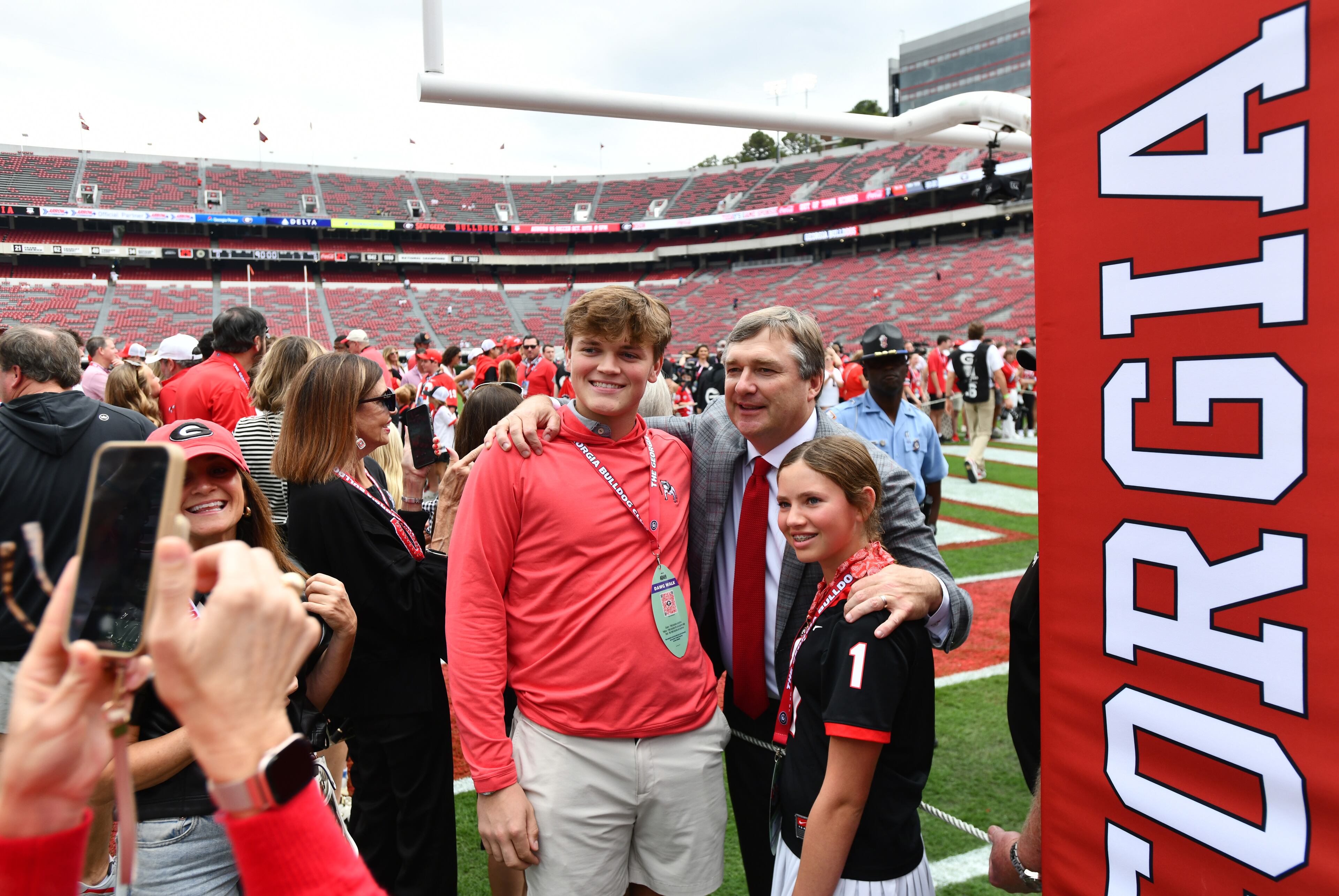 Georgia head coach Kirby Smart poses with fans during the Dawg Walk before an NCAA football game against Mississippi at Sanford Stadium, Saturday, October 18, 2025, in Athens. (Hyosub Shin/AJC)